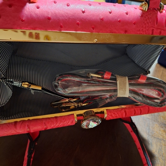 Ruby is a unique handbag that is made of faux leather.  She has a center jeweled - Picture 5 of 7